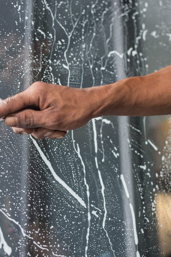 Cleaning windows with a squeegee